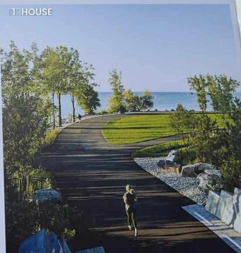 Phối cảnh tuyến đường dạo bộ ven sông trong hành lang thoát lũ Hòa Xuân — ảnh chụp từ bảng thông tin dự án tại công trường